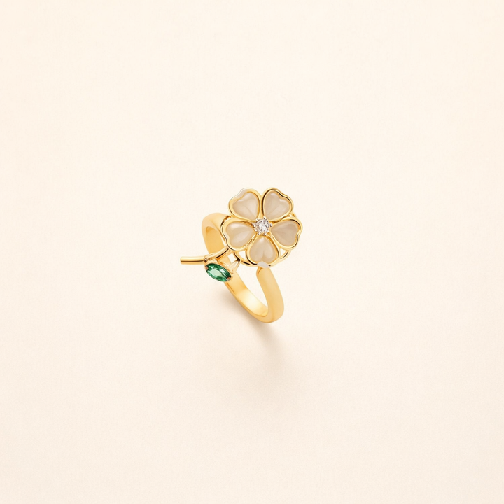 Περιστρεφόμενο χρυσό δαχτυλίδι με φύλλα