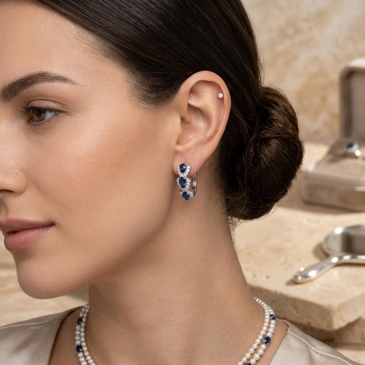 Sapphire-Studded Silver Hoop Earrings with Halo Design