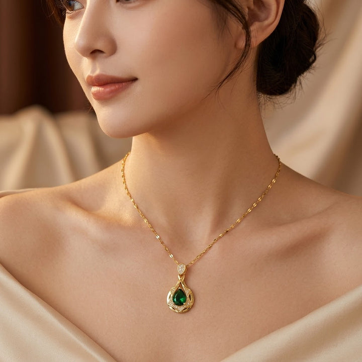 Gold Teardrop Pendant Necklace with Emerald Accent