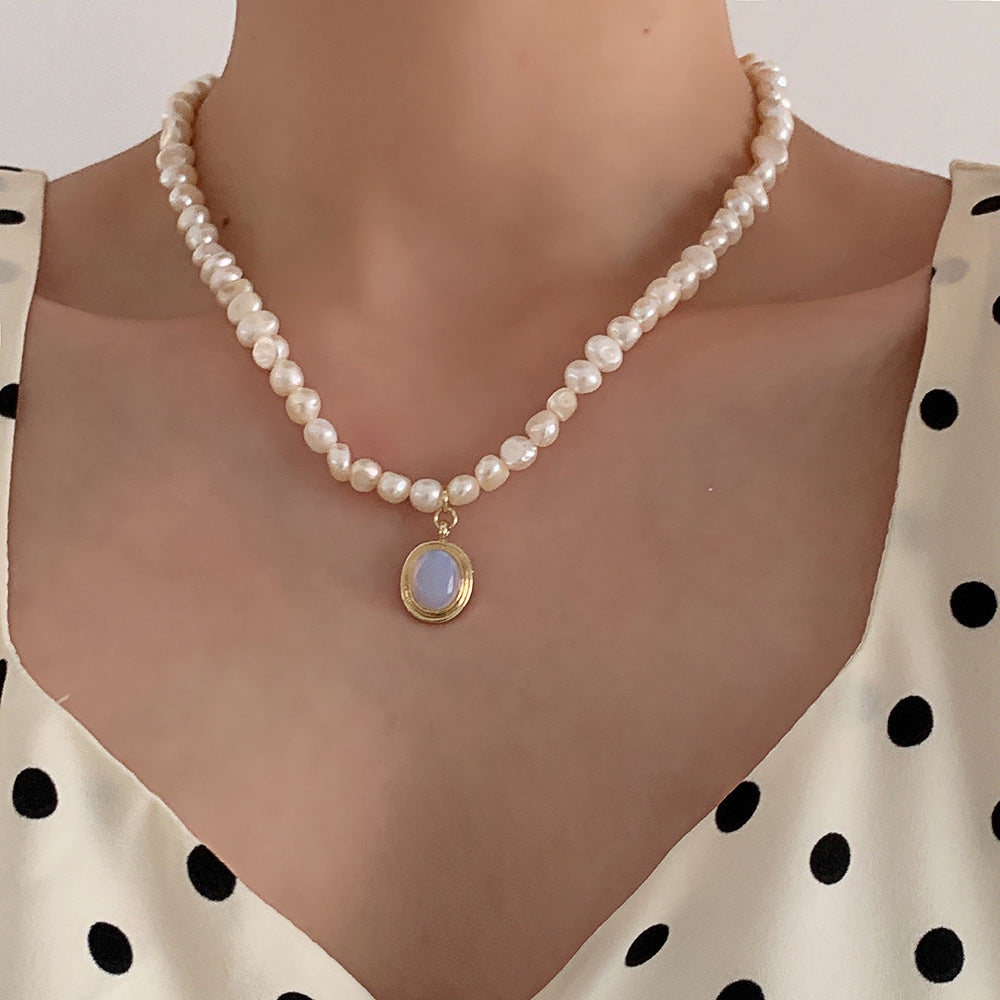 Lunar Gemstone Pendant Necklace Featuring Pearl Details
