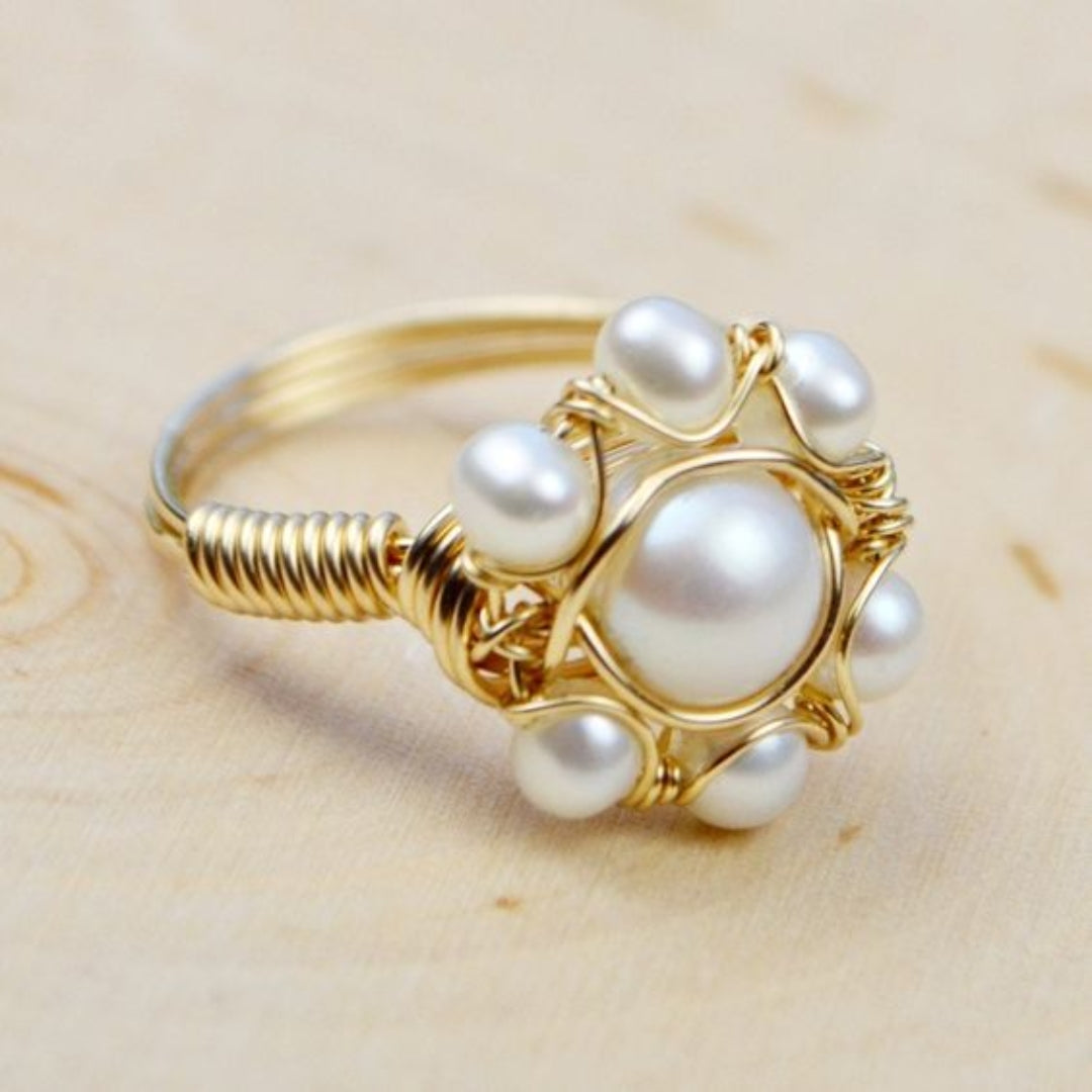 Vintage Gold Ring Adorned with Inlaid Pearls