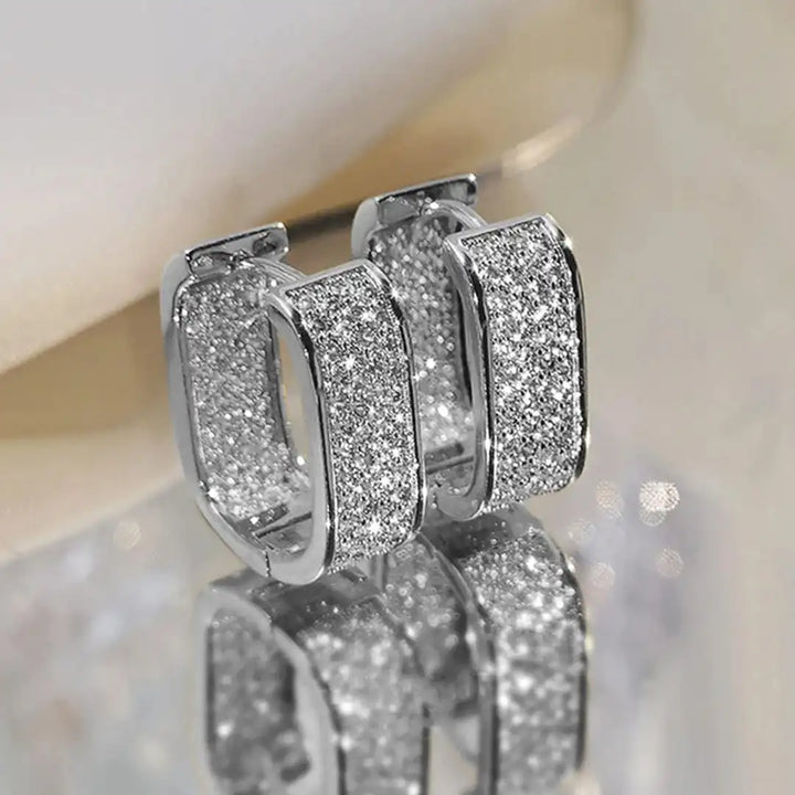 Pavelina Huggie Hoop Earrings