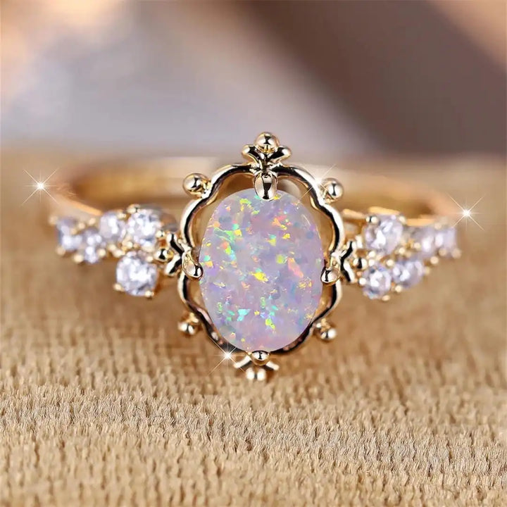 Oval Floral Ring Featuring a White Fire Opal Gemstone