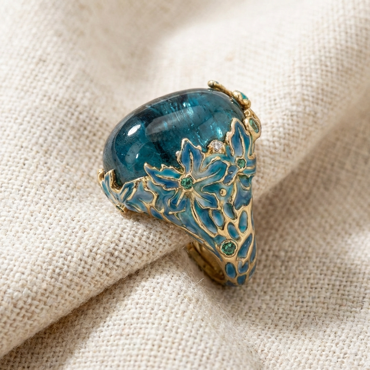Sophisticated Gold Floral Ring with Blue Gemstone