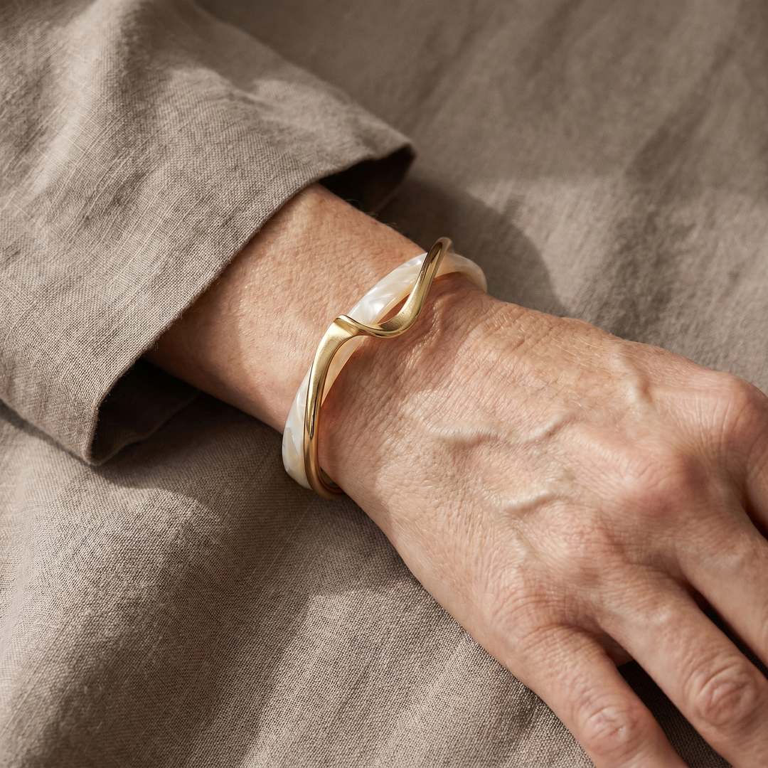 Sophisticated Gold Bracelet Adorned with White Opal Details
