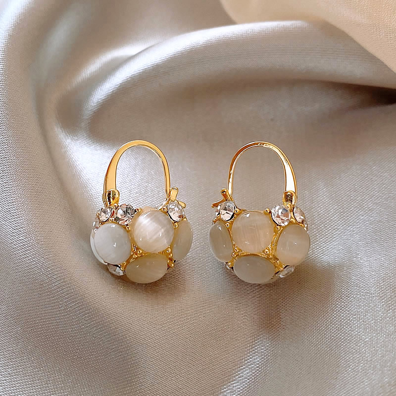 Pearl Earrings Adorned with Gold Crystal Accents