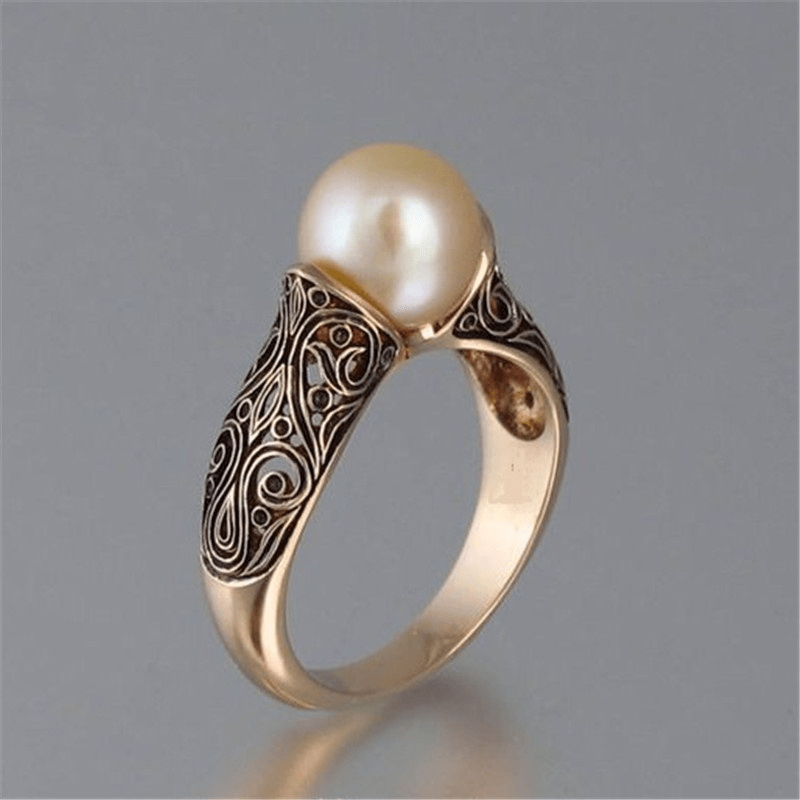 Ρετρό δαχτυλίδι με χρυσές πέρλες